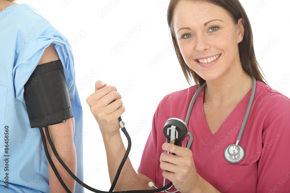 Young Female Doctor Taking The Blood Pressure Of A Female Patient Young Female Doctor Taking The Blood Pressure Of A Female Patient