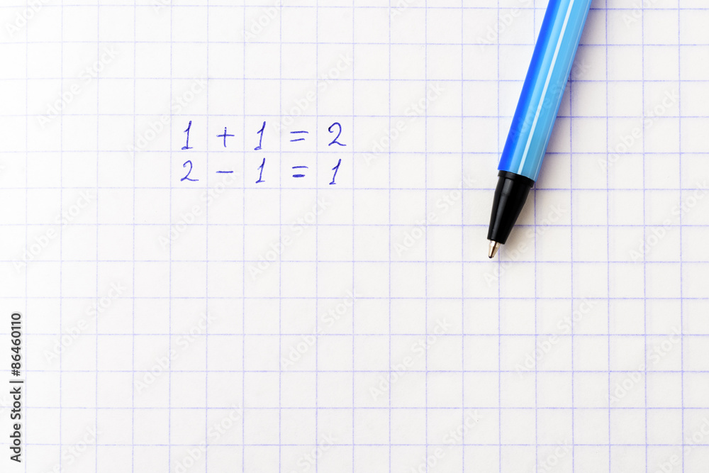 Mathematical examples are written on a sheet of paper into a cell Mathematical examples are written on a sheet of paper into a cell