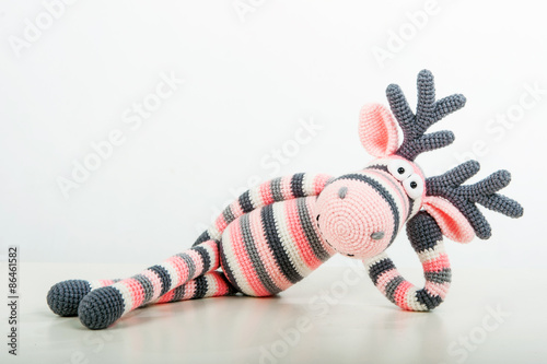 Soft toy lying elk