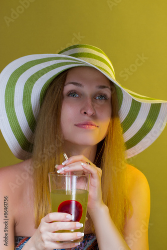 Woman drinking a cocktail 