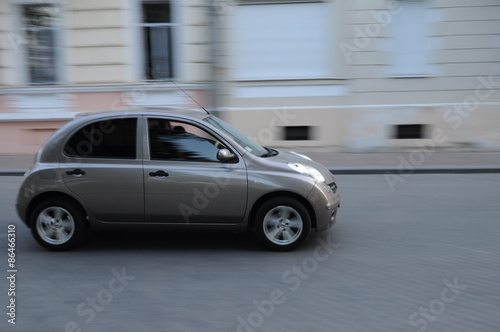 Gray car motion on the street © vector_master
