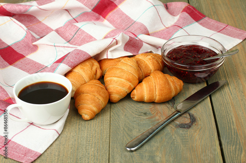 Fototapeta Naklejka Na Ścianę i Meble -  Breakfast, croissants with jam and coffee