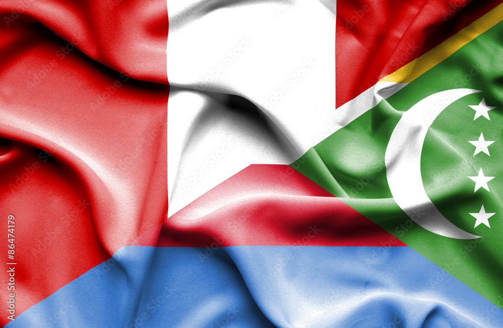 Waving flag of Comoros and Peru Waving flag of Comoros and Peru