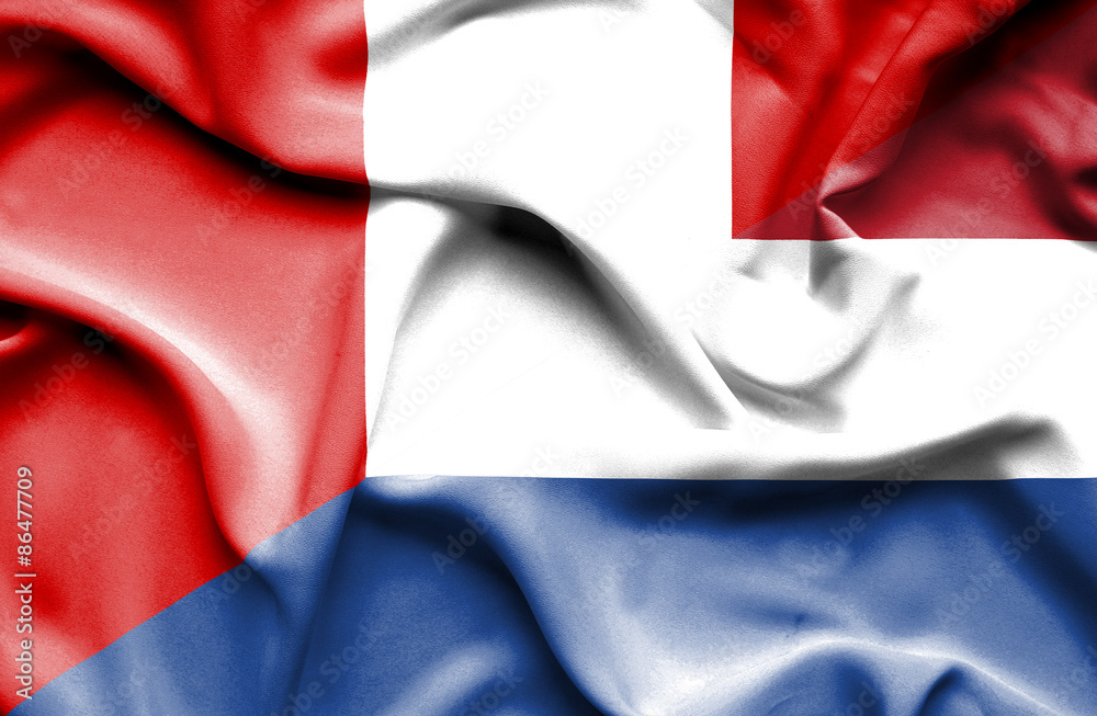 Waving flag of Netherlands and Peru Waving flag of Netherlands and Peru