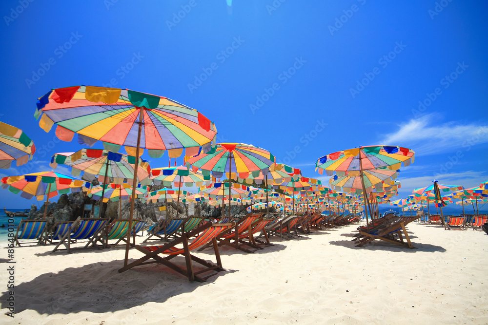 PHUKET beach with color umbrella