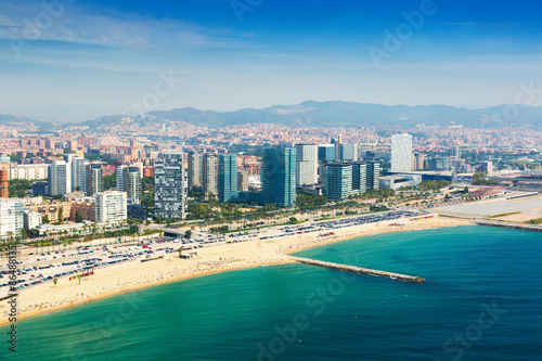 Aerial view of Barcelona from Mediterranean sea in summer #86488135