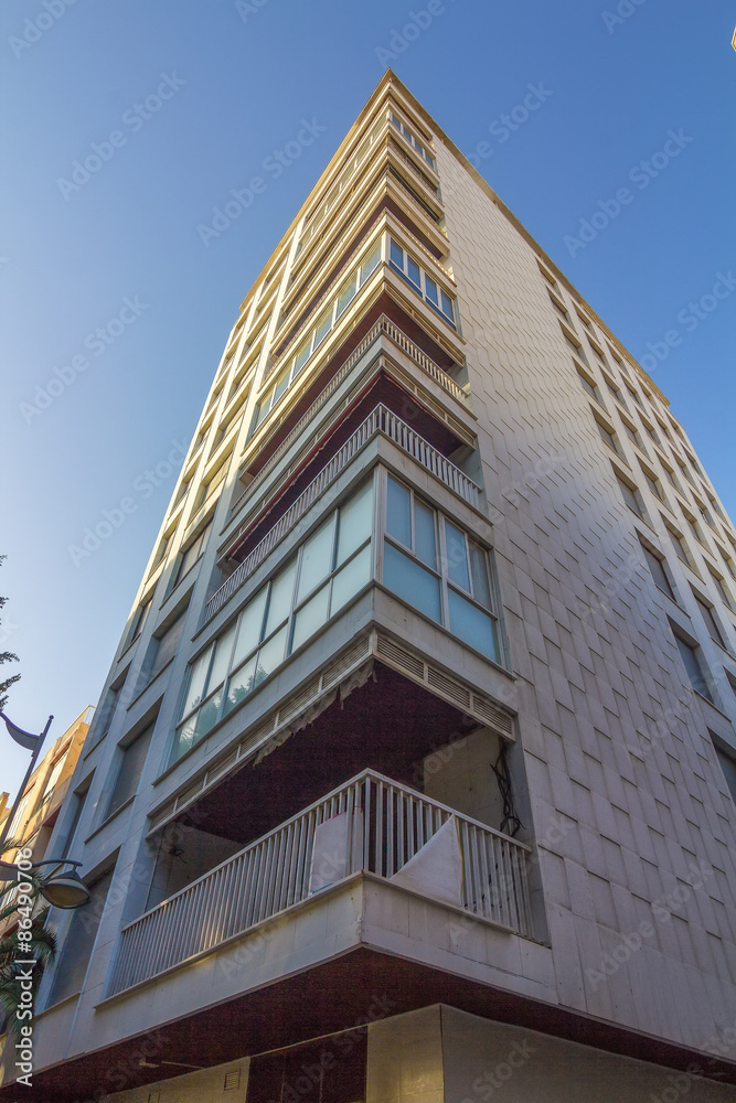 residential building in perspective with blue sky