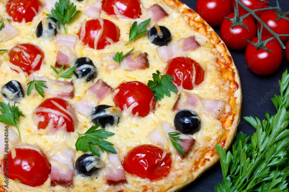 pizza with bacon, olives and tomato pizza with bacon, olives and tomato