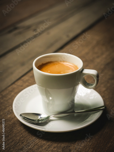 cup of coffee latte on the wood texture