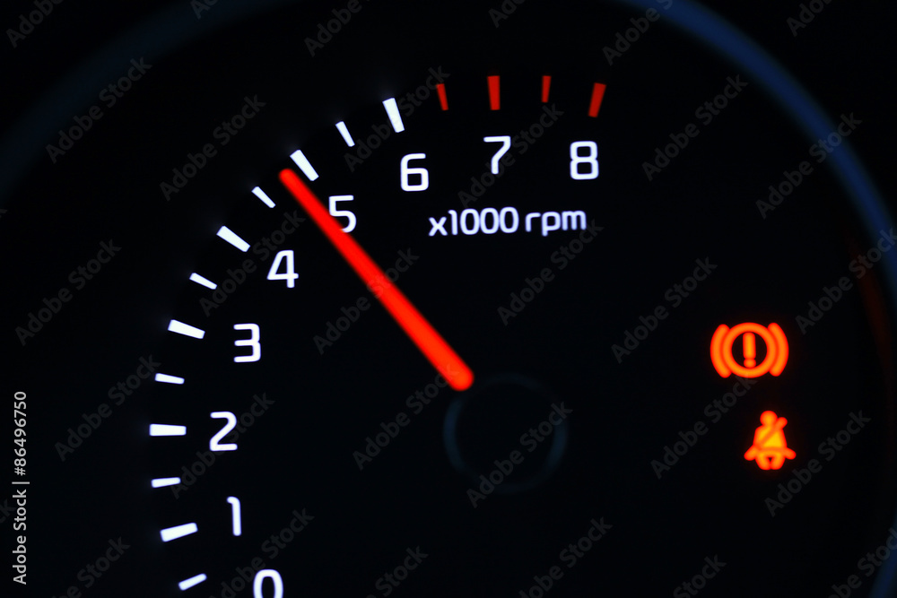 car dashboard speedometer tachometer macro
