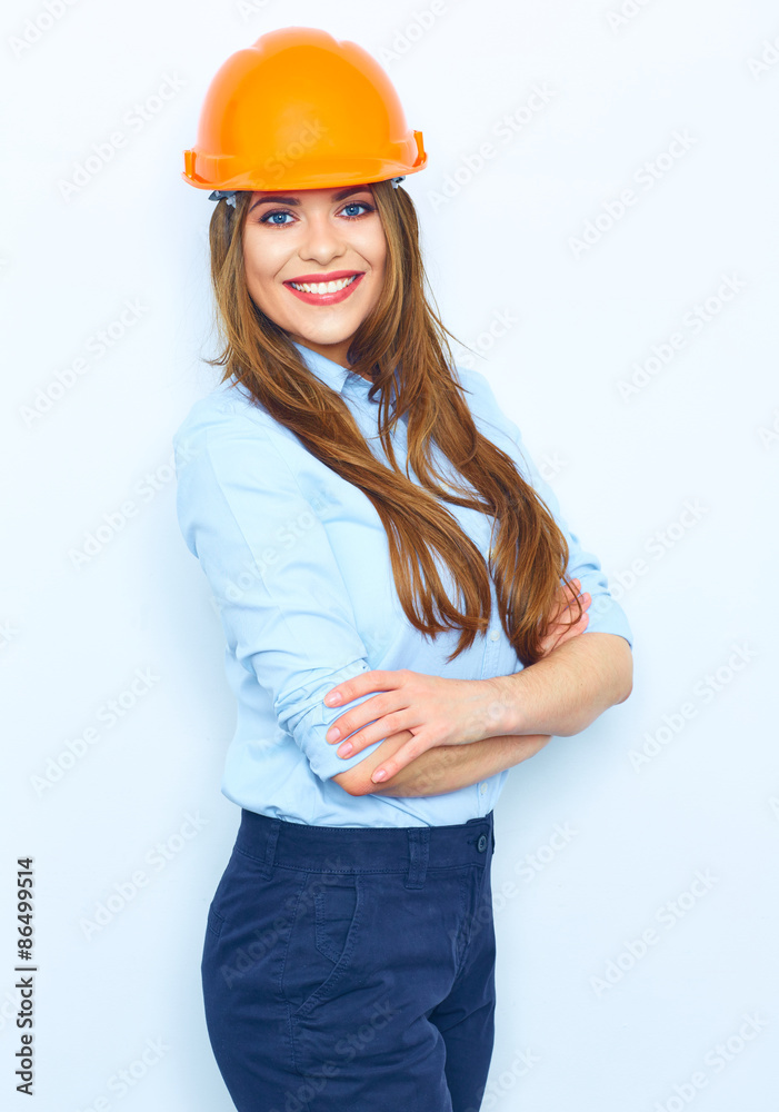 Arhcitect business woman standing against white wall with cross Arhcitect business woman standing against white wall with cross