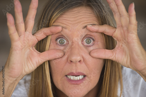 Portrait surprised mature woman big eyes © roboriginal