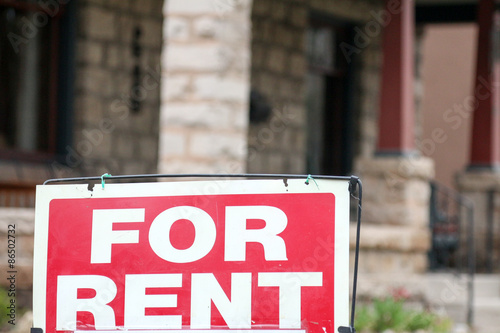 Принти на полотні For rent sign posted in front of a blurry front porch