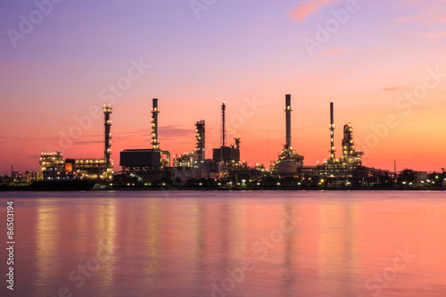 Oil refinery silhouette along the river at sunrise time (Bangkok, Thailand)