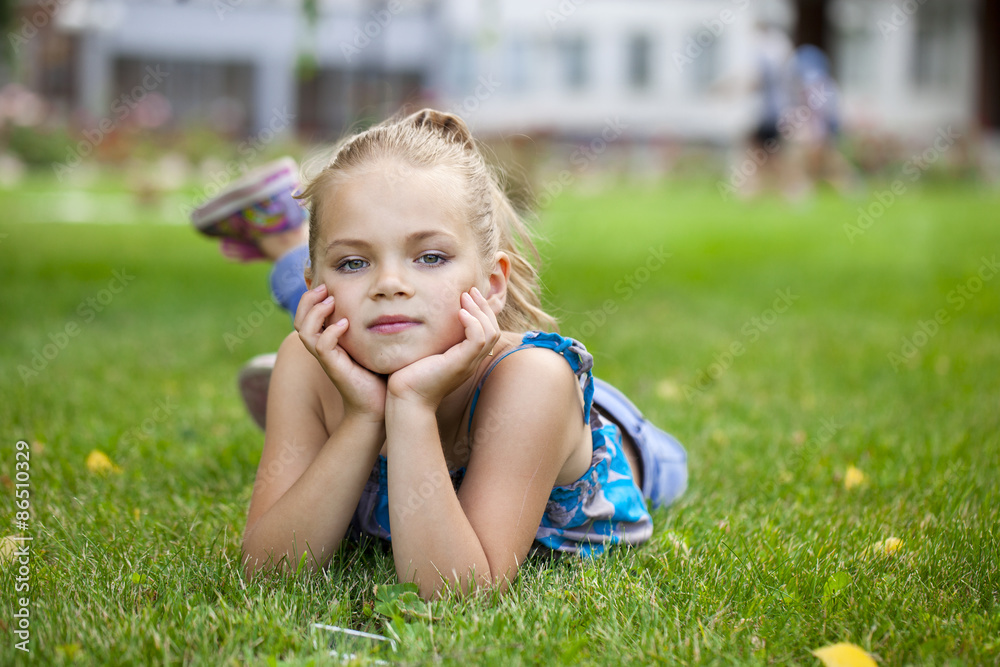 Little happy girl in summer park Little happy girl in summer park