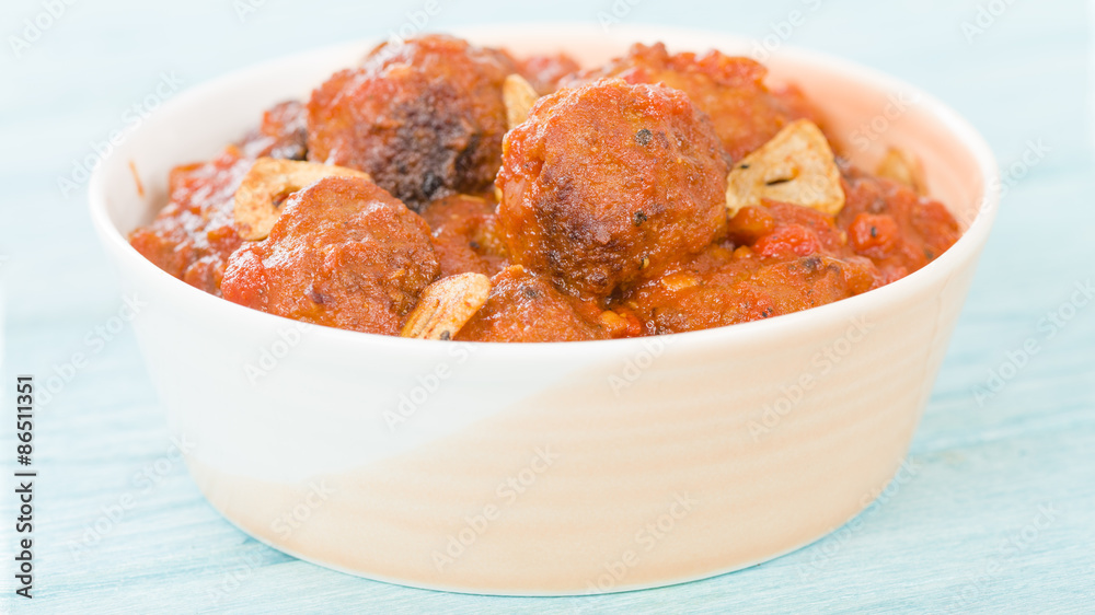 Albondigas Guisadas - Meatballs in tomato sauce with garlic slivers and thyme leaves.
Albondigas Guisadas - Meatballs in tomato sauce with garlic slivers and thyme leaves.
