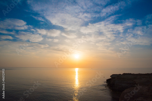 Rocky sea shore on the beautiful sunrise