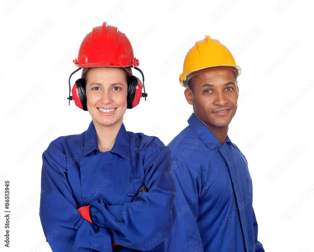 Young couple with clothing workers safety at work Young couple with clothing workers safety at work