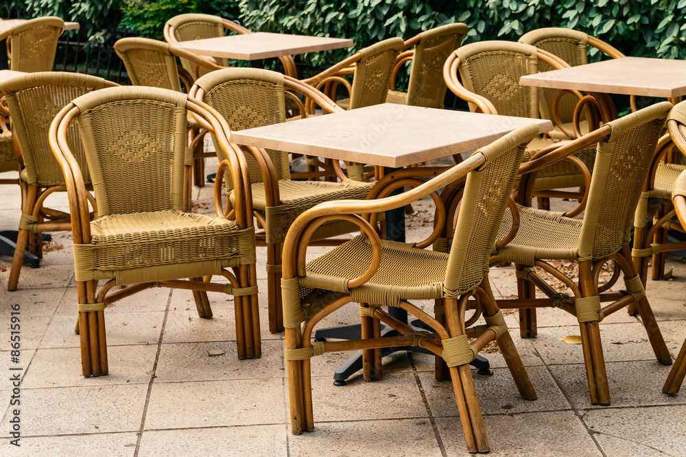 Summer cafe with rattan chairs of the Corfu town, Greeece