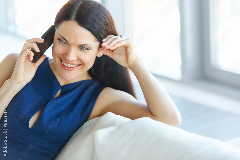 Business Woman Talking On Her Cellphone at Office. Business People Business Woman Talking On Her Cellphone at Office. Business People