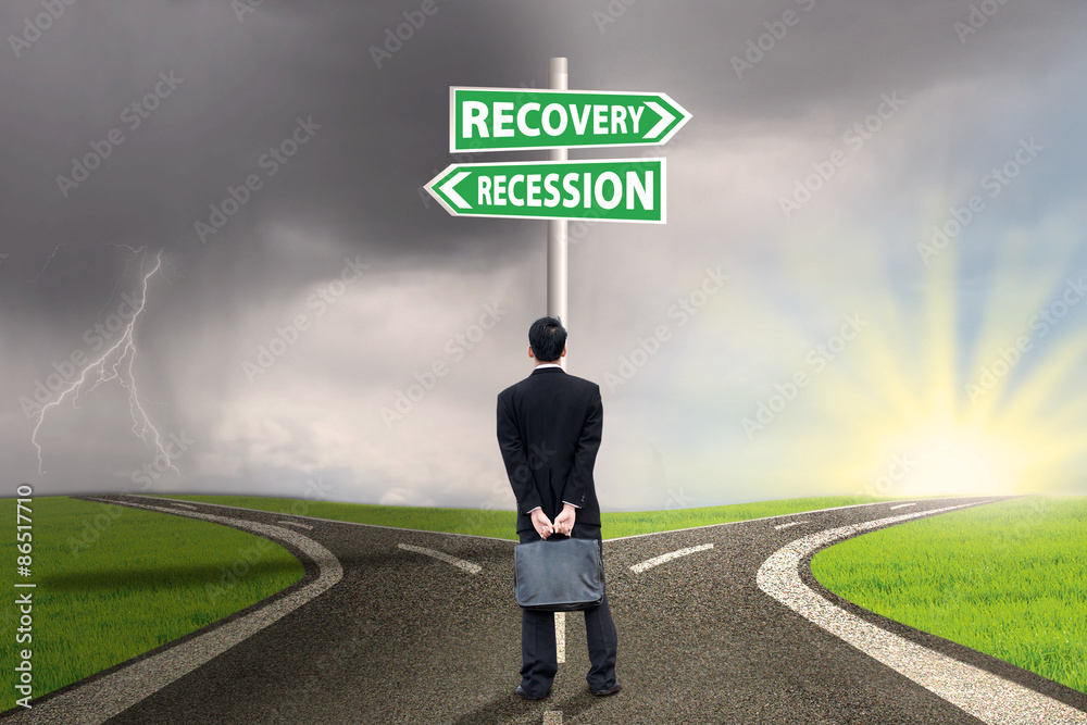 Person with signpost of recession and recovery finance Person with signpost of recession and recovery finance