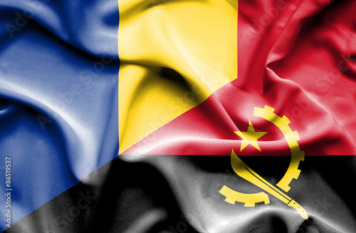 Waving flag of Angola and Romania