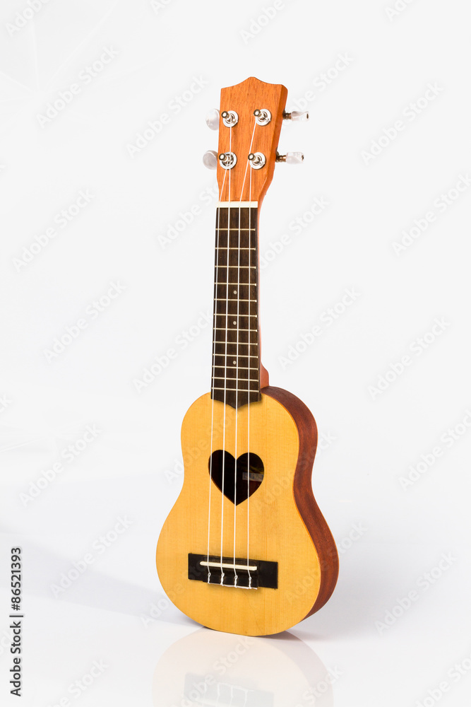 Obraz premium Close up of ukulele on white background