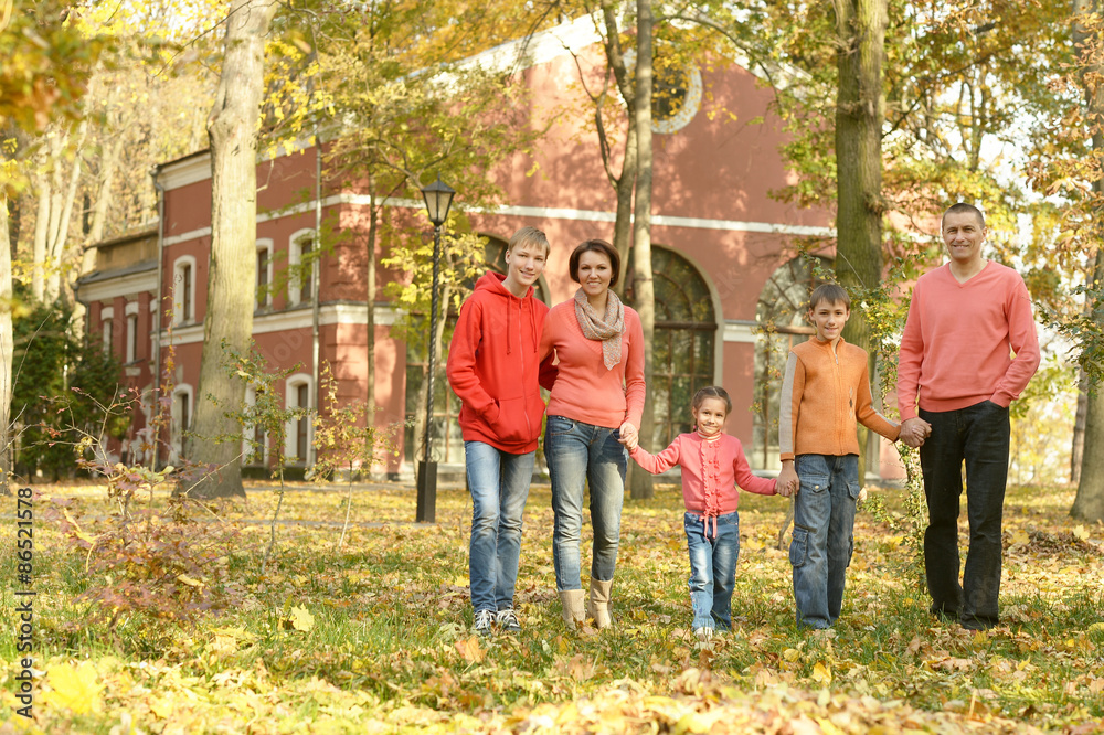 Family relaxing in autumn park Family relaxing in autumn park