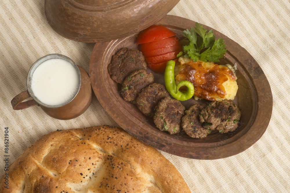 Meatball with served buttermilk and ramadan pita Meatball with served buttermilk and ramadan pita