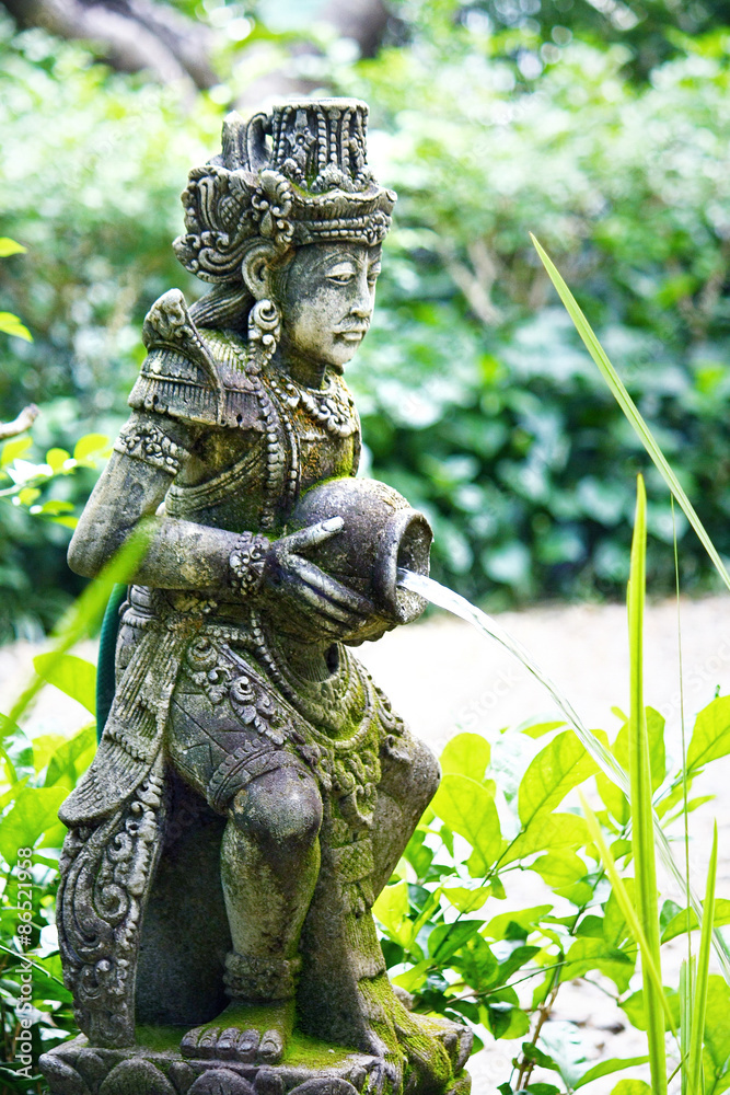 Water bearer garden statue