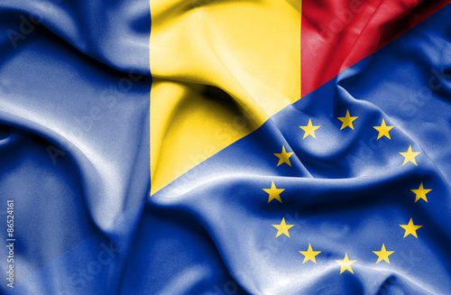 Waving flag of European Union and Romania