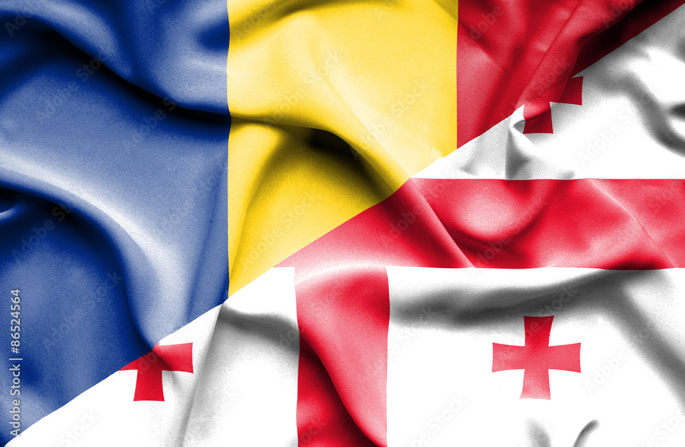 Waving flag of Georgia and Romania Waving flag of Georgia and Romania