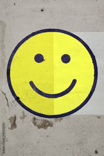 Happy Smiley Painted On The Old Cracked Concrete Wall