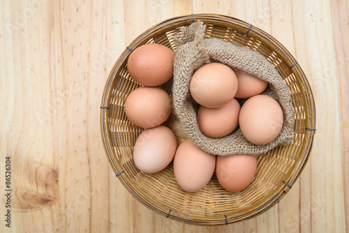 eggs on plate wood background