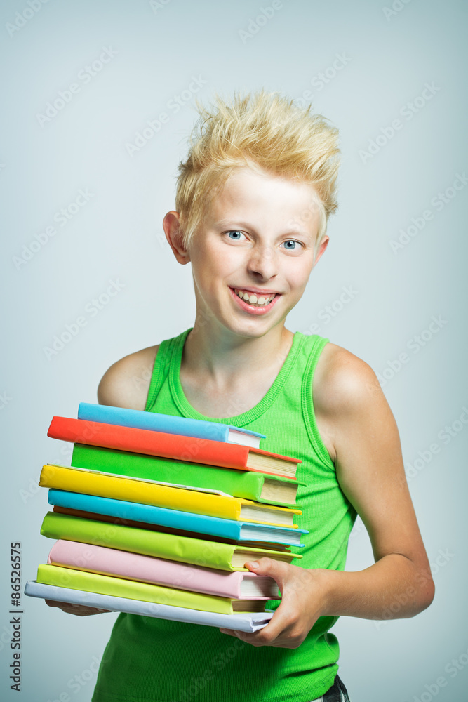 boy with a stack of books boy with a stack of books