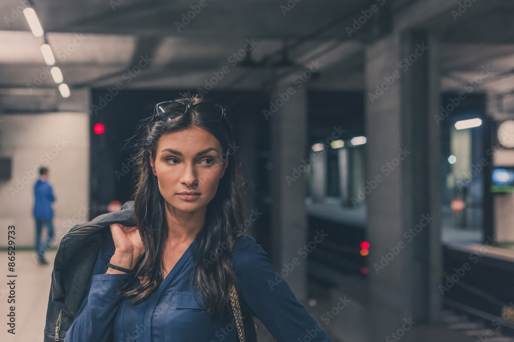Beautiful girl posing on an escalator Beautiful girl posing on an escalator