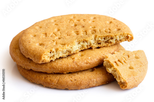Stack of sweetmeal digestive biscuits isolated on white.