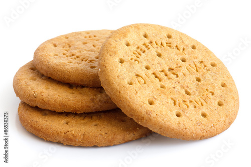 Stack of sweetmeal digestive biscuits isolated on white.