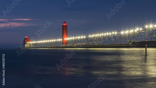 A night view of lit up lighthouse in Grand Haven, Michigan