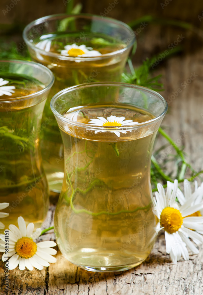 Fresh chamomile tea, selective focus Fresh chamomile tea, selective focus