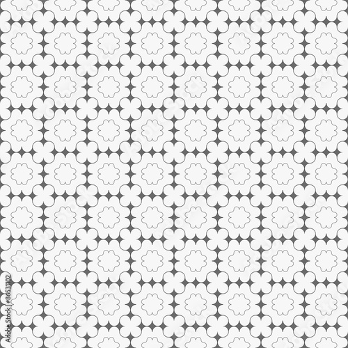 Gray ornament with dark gray pointy squares and clover shapes