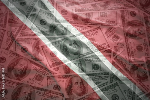 colorful waving trinidad and tobago flag on a american dollar money background
