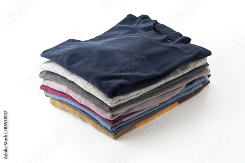 Stack of clothes isolated on white background