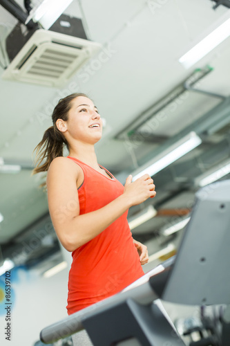 Young woman training in the...
