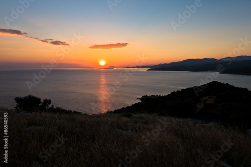 Sunset at Toroni bay near old roman fortress  Sithonia