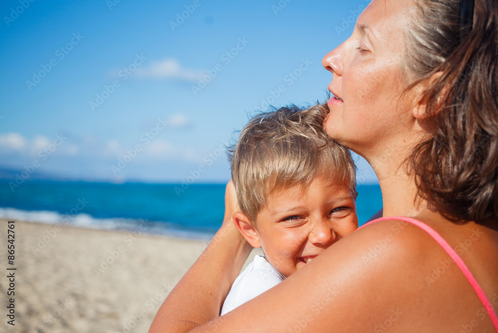 Mother and her son at beach