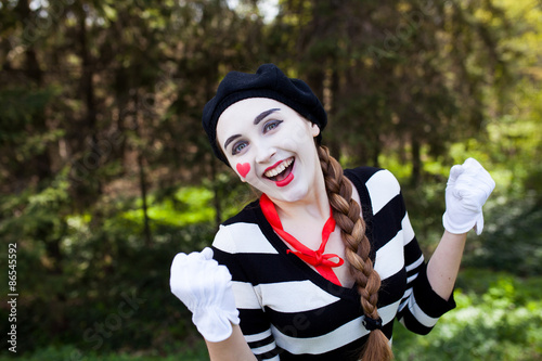 Emotional Mime on the park background