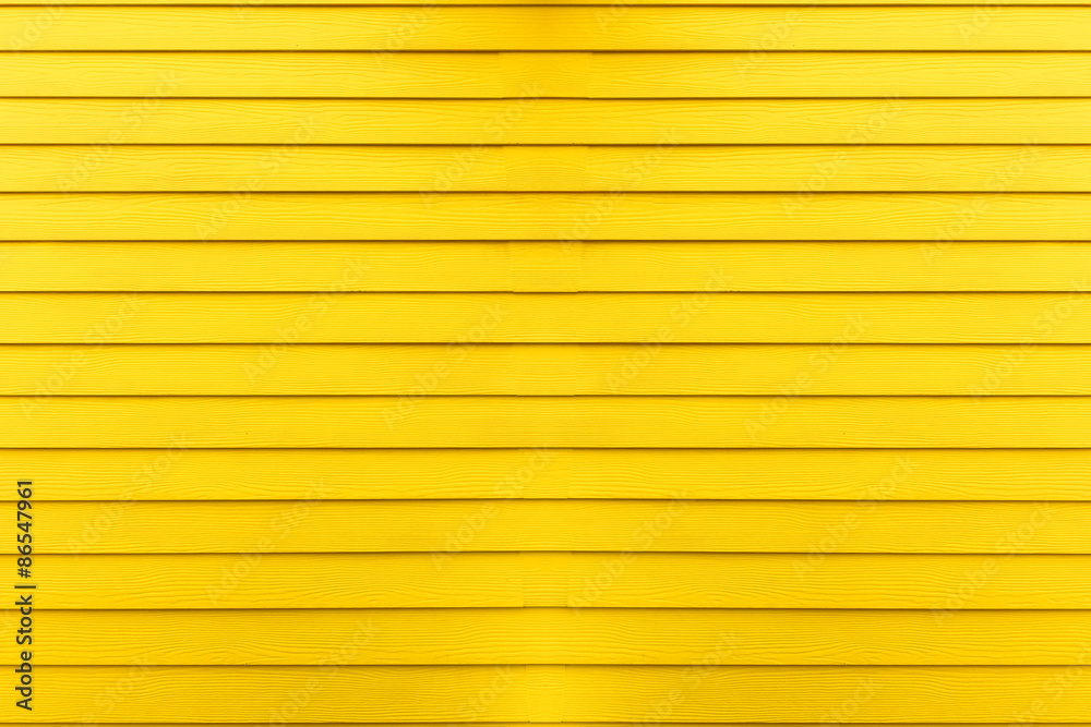 Obraz premium Yellow wooden background