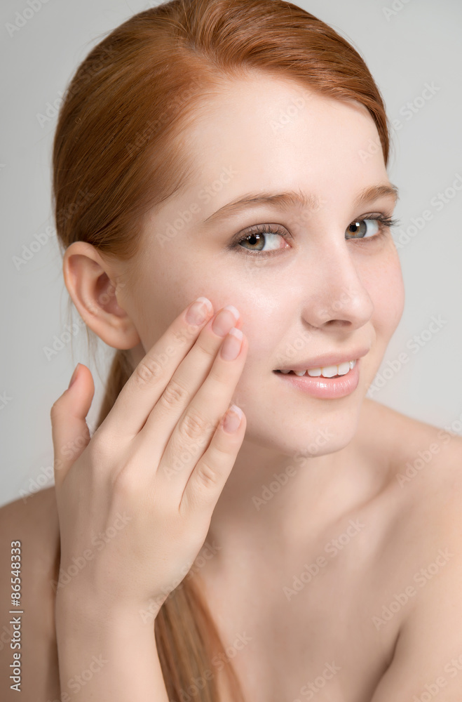 attractive young redhead model with clean fresh skin attractive young redhead model with clean fresh skin