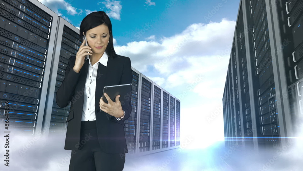 Businesswoman on the phone and holding tablet Businesswoman on the phone and holding tablet